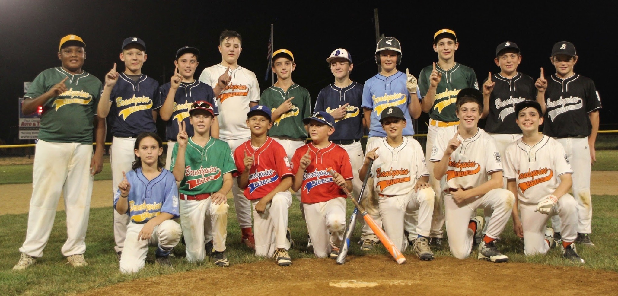 The 2016 Brandywine Little League graduates together on the field after the inaugural Graduation Game