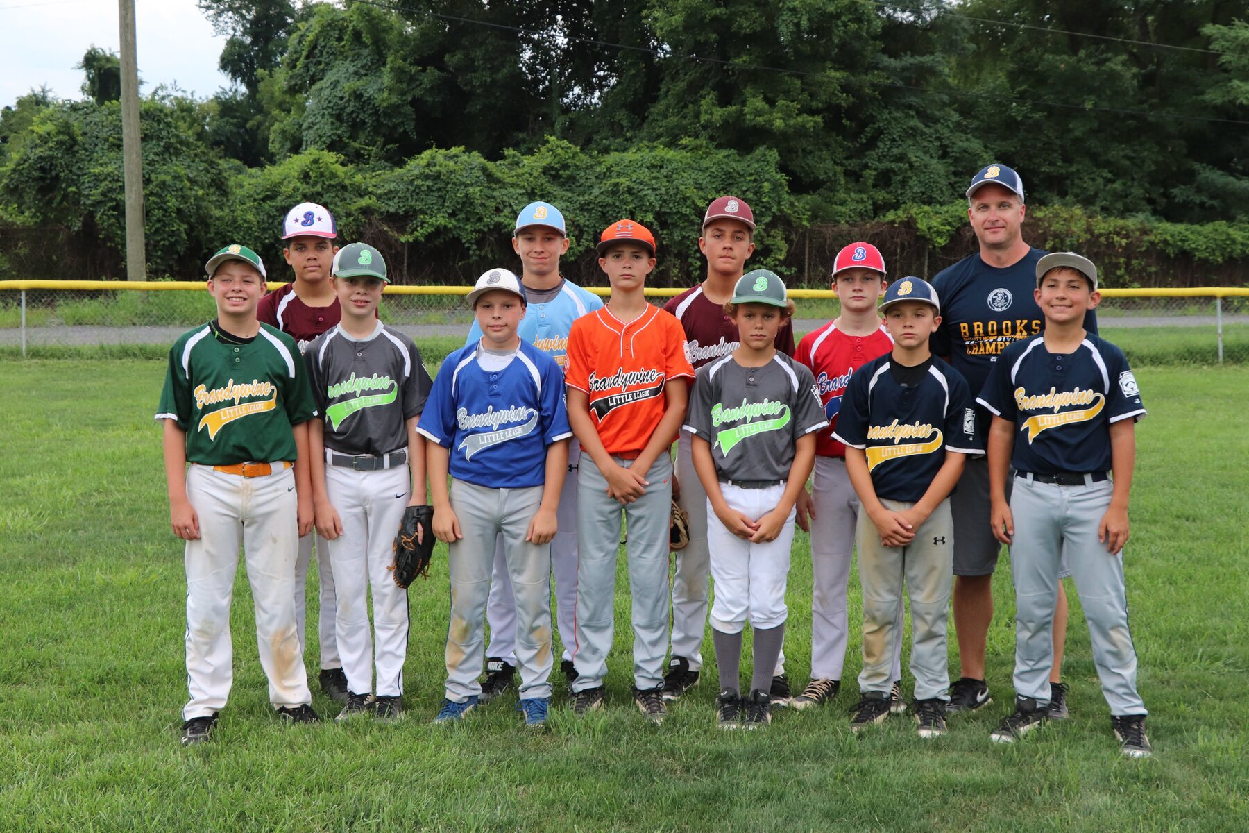 The 2018 Brandywine Little League graduating players together on the field