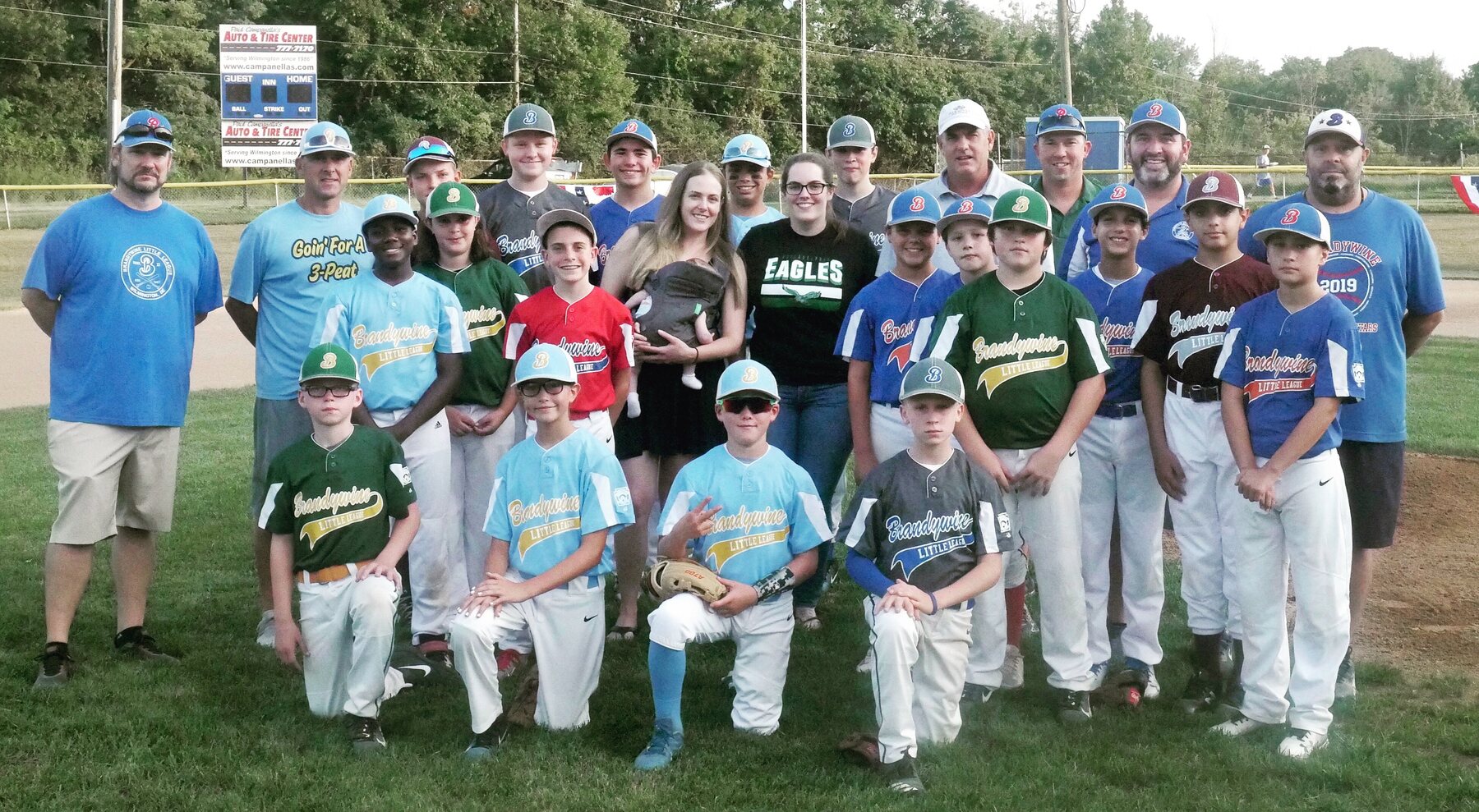 The 2019 Brandywine Little League graduates and coaches together on the field